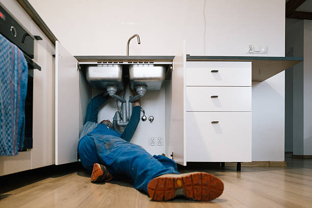 Professional Drain Cleaning technician working in Mona, UT